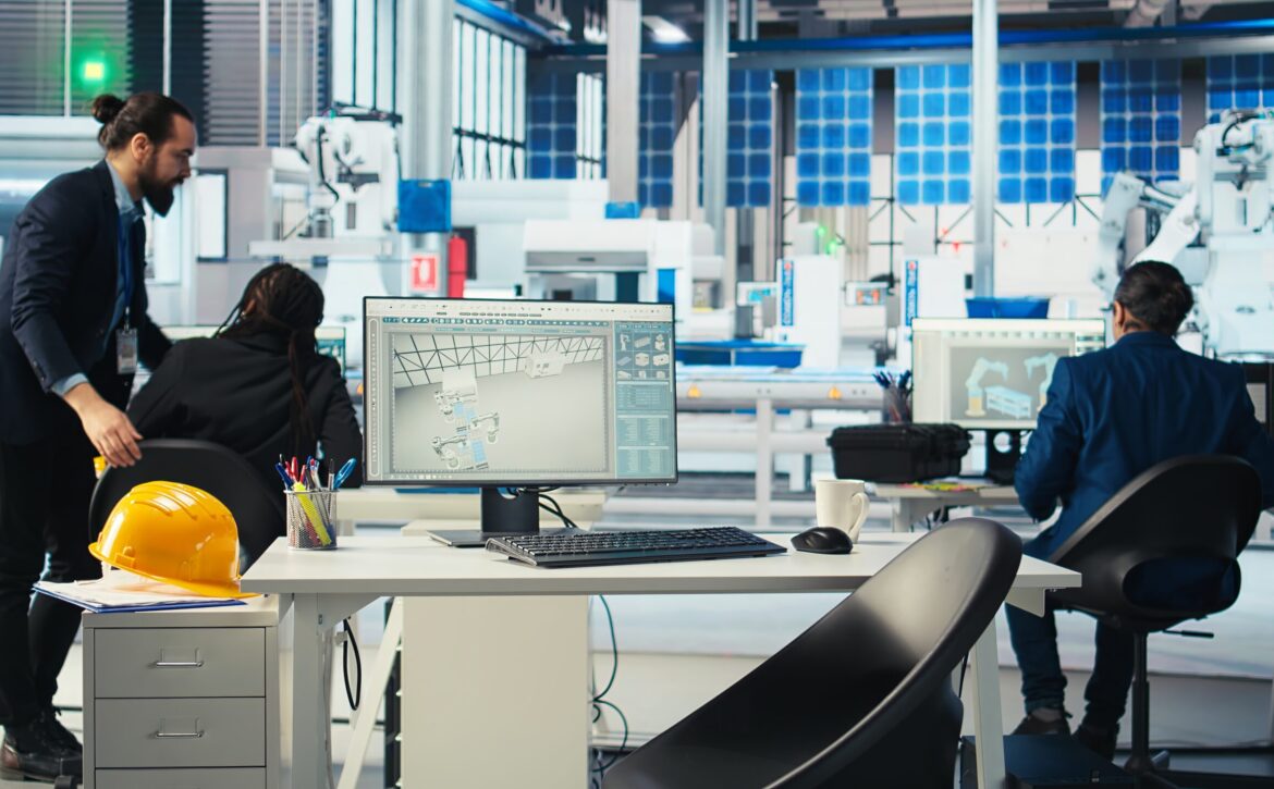 Photovoltaics factory manager walking to employees desks to give tasks